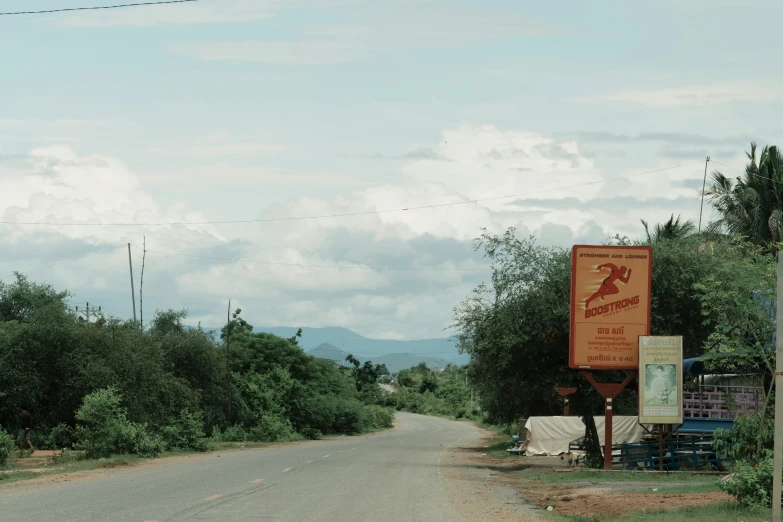 a country road near the sign for a ski resort