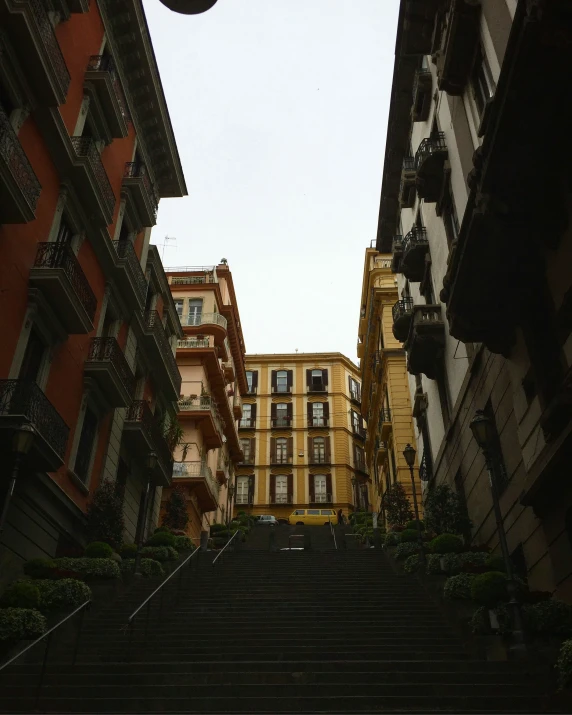 view of a building, some windows, and staircase leading to the sky