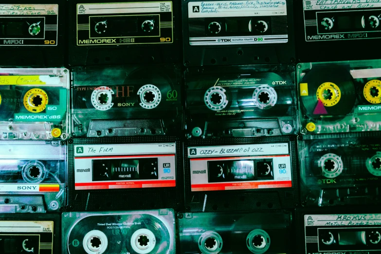 a wall of old time cassettes that are lined up together