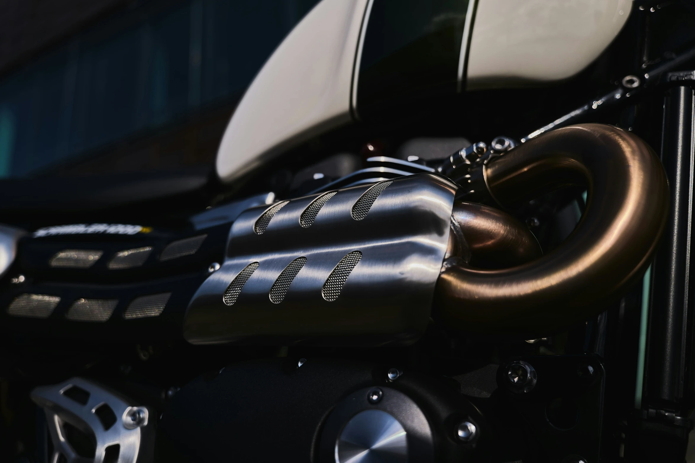 the motorcycle handlebars and the chain of the bike