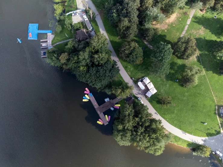 an aerial s of the parking lot along side of the river