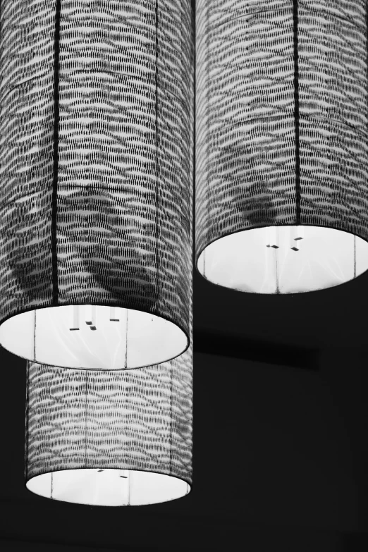 a close up of two lamps in a room