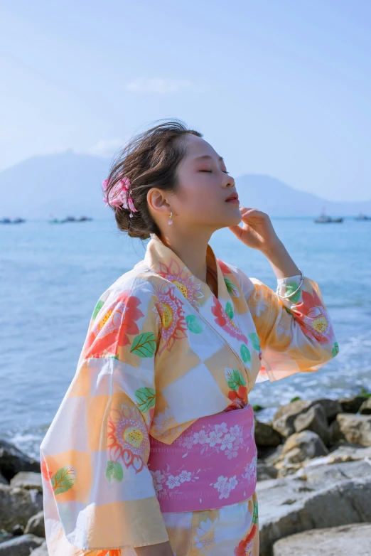 the woman is taking a break from her bathrobe