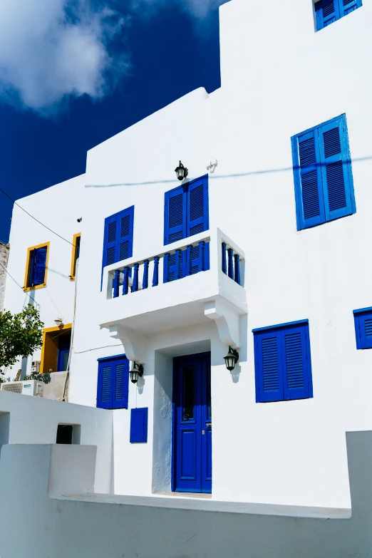 blue and white buildings are all painted a lot like this