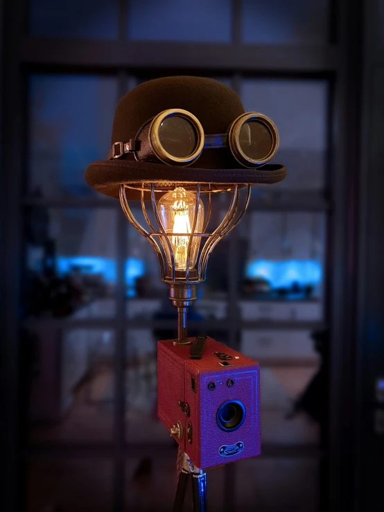 a lamp with a binoculars mounted on top of it