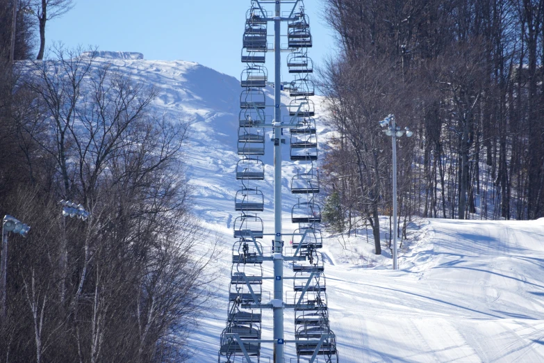 a ski lift with several people on it