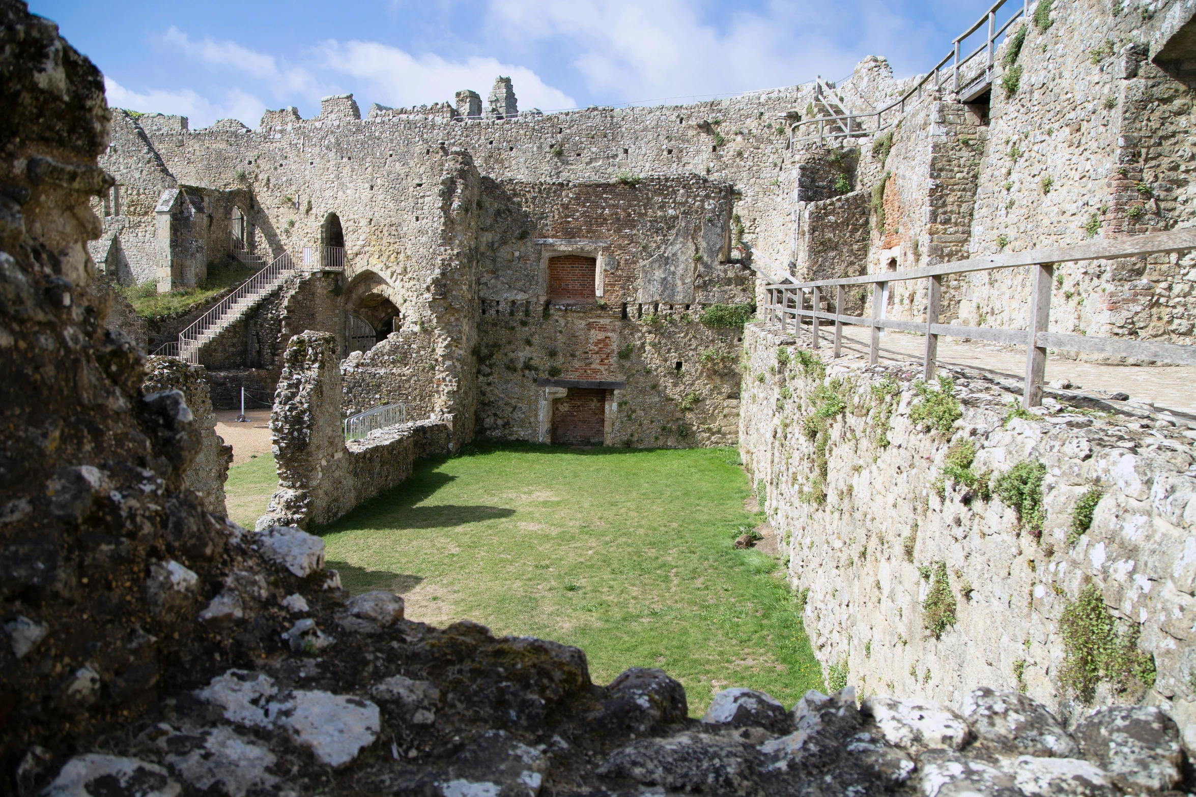 the view through an archway into a castle