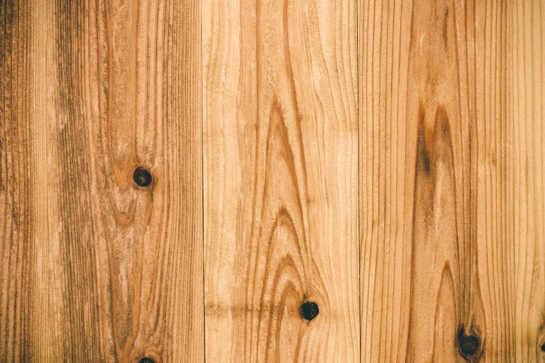 a wood wall with some wood grains on it