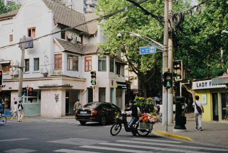 a street scene with a bicycle and cars