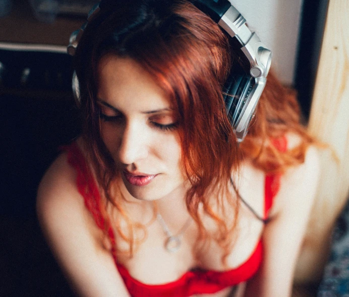 a woman wearing headphones on top of her ears