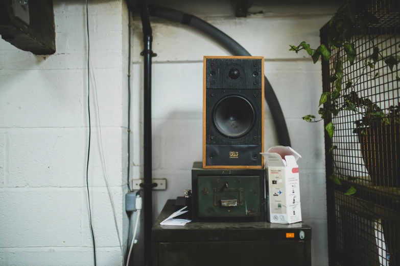 speakers and boxes are sitting on top of each other