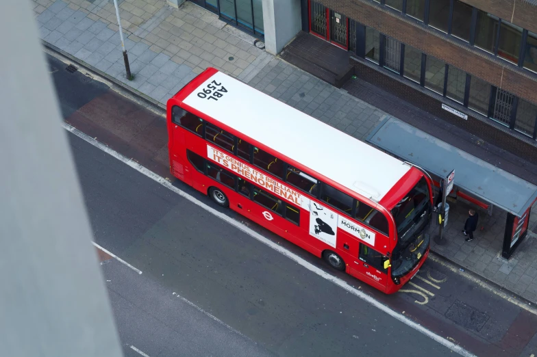 a double decker bus at a city intersection