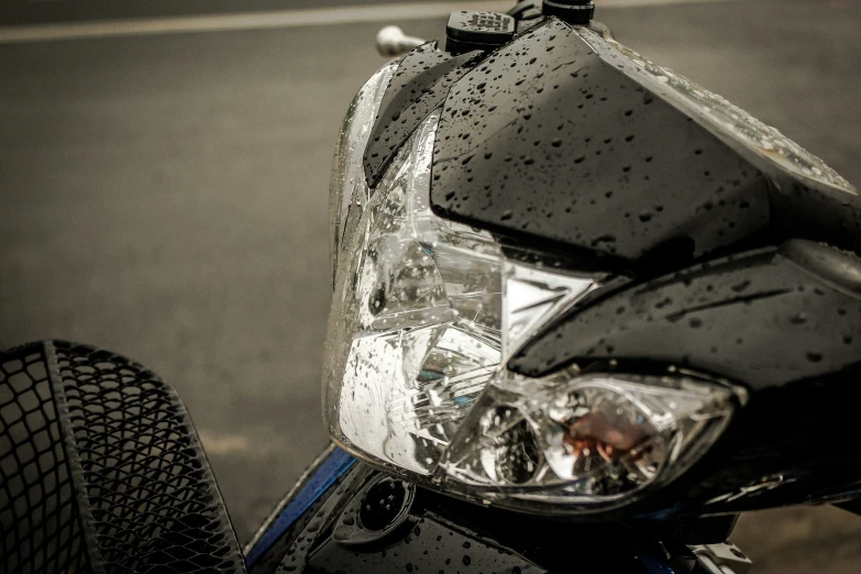 the front end of a motorcycle is wet