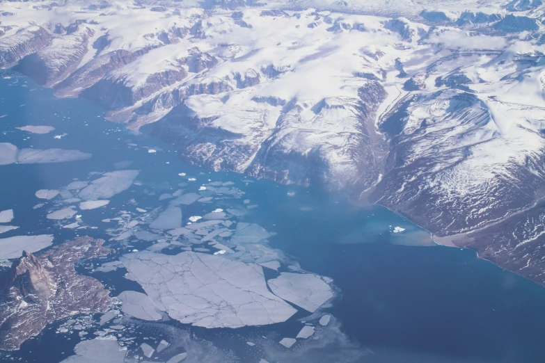 snow capped mountains seen from an air plane