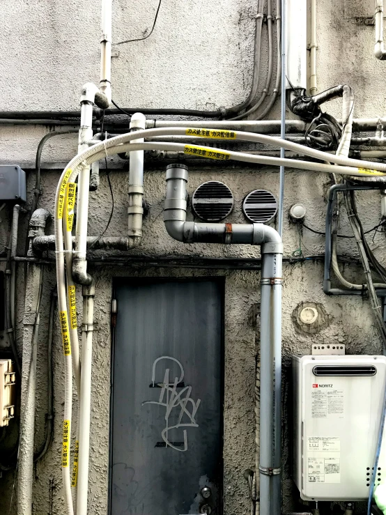 a door that is in front of some wires