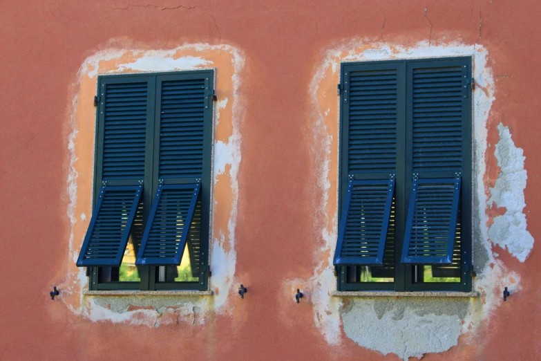 a close up of a window with two closed