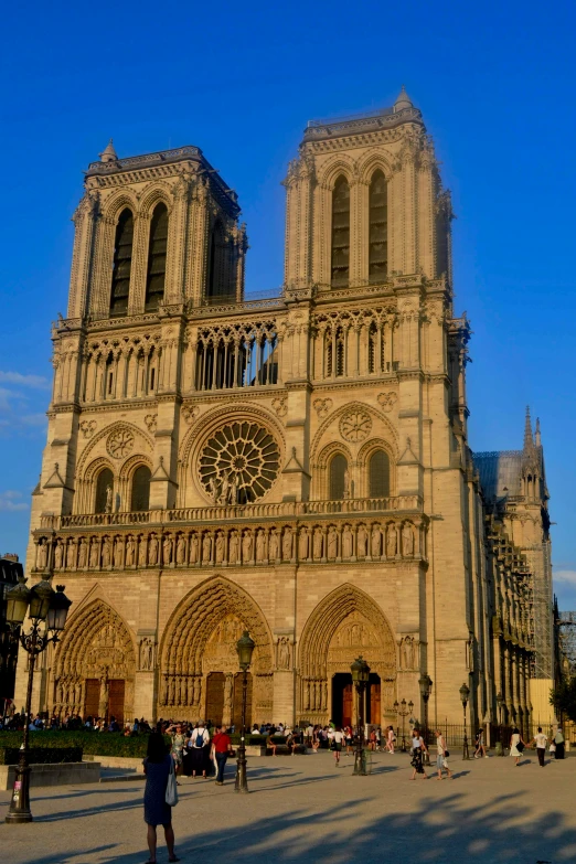 a view of a very large cathedral near the street