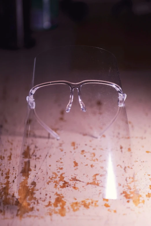 a pair of glasses are sitting on a table