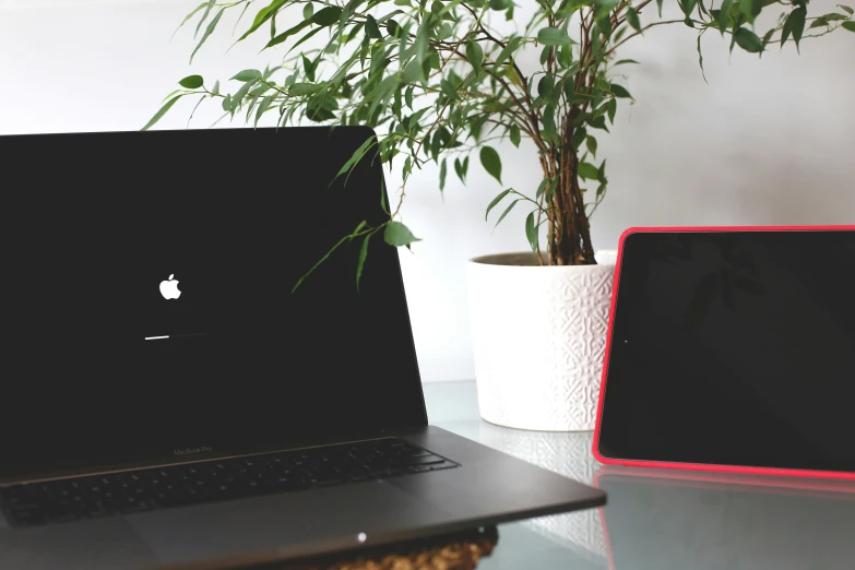 a laptop sitting on top of a table