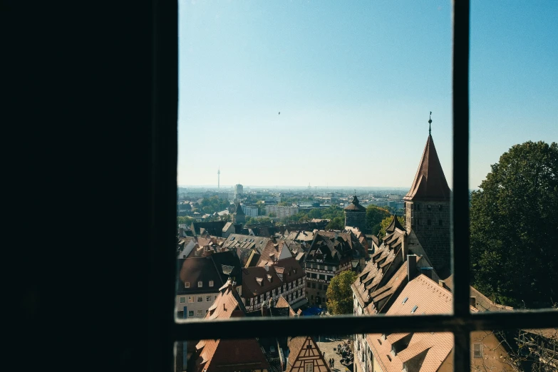 an overview of a city from behind a window