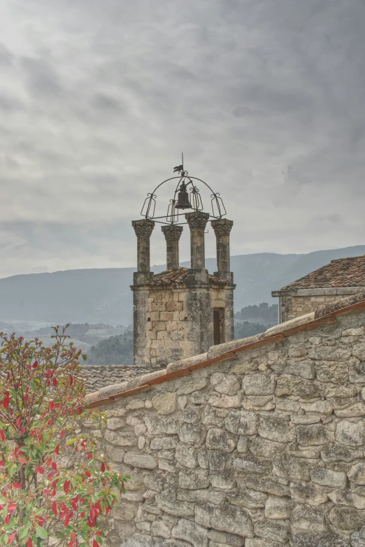 an old stone building with two bell towers