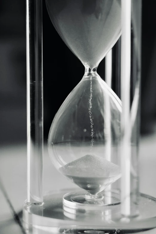 an hourglass sitting on top of a table