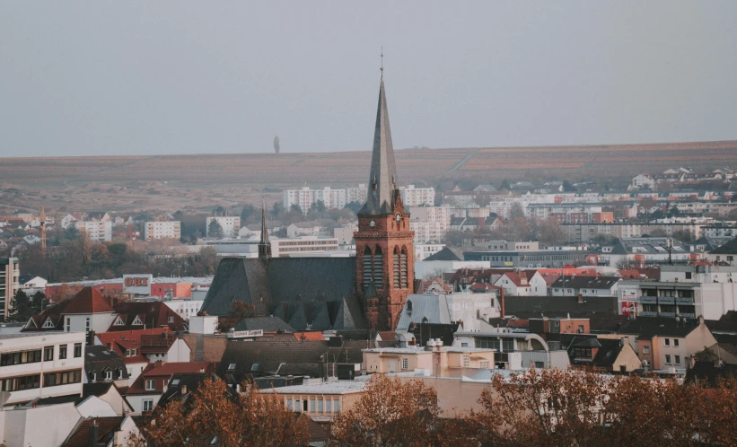 some buildings and a clock tower in the city