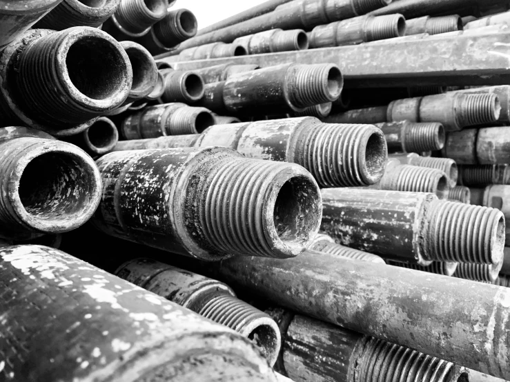 a pile of old pipes and springs piled on top of each other