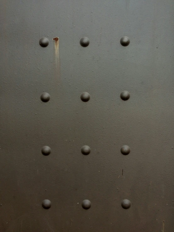 water drops are shown on the surface of an open glass door