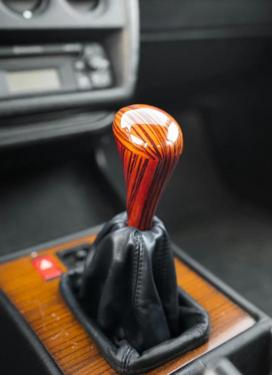 the car's steering wheel has been made of black leather