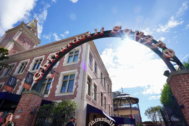 an arch decorated with lots of letters and decorations