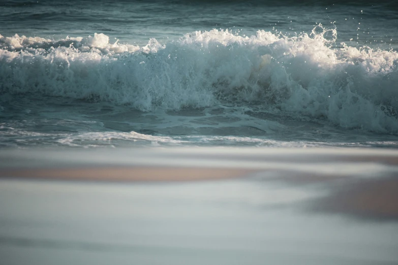 an abstract pograph of water and waves on the beach