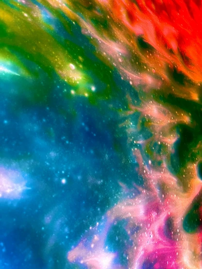 a colorful space scene with stars and dust