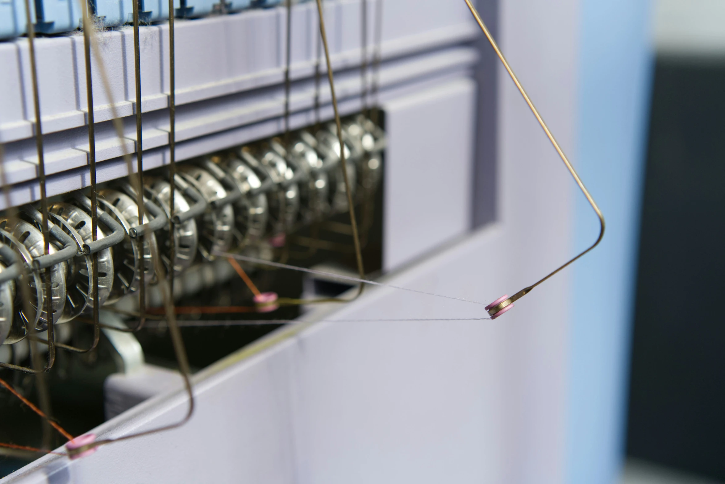 the inside of an automated machine is shown with wires