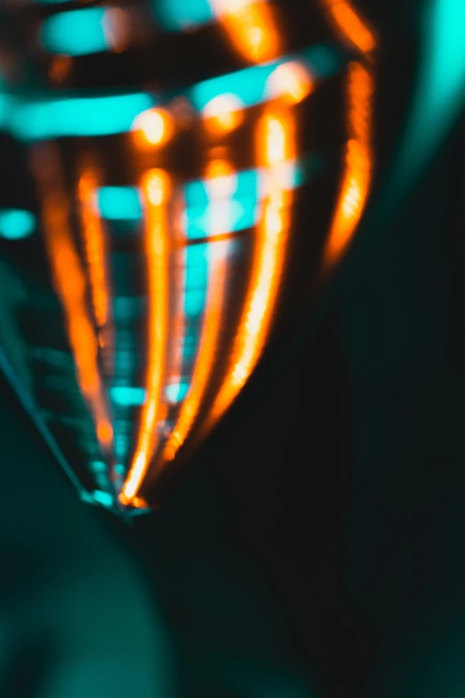 the corner of a glass showing the reflection of light from the glass