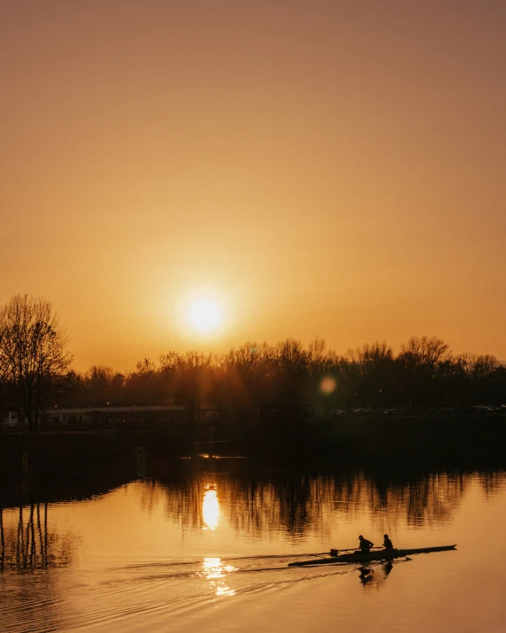 two people in canoes on a body of water