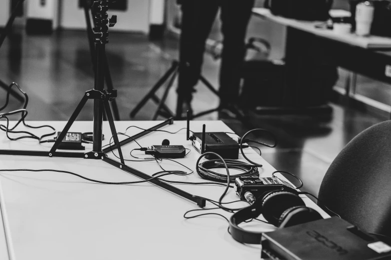 a black and white po of musical equipment in the studio