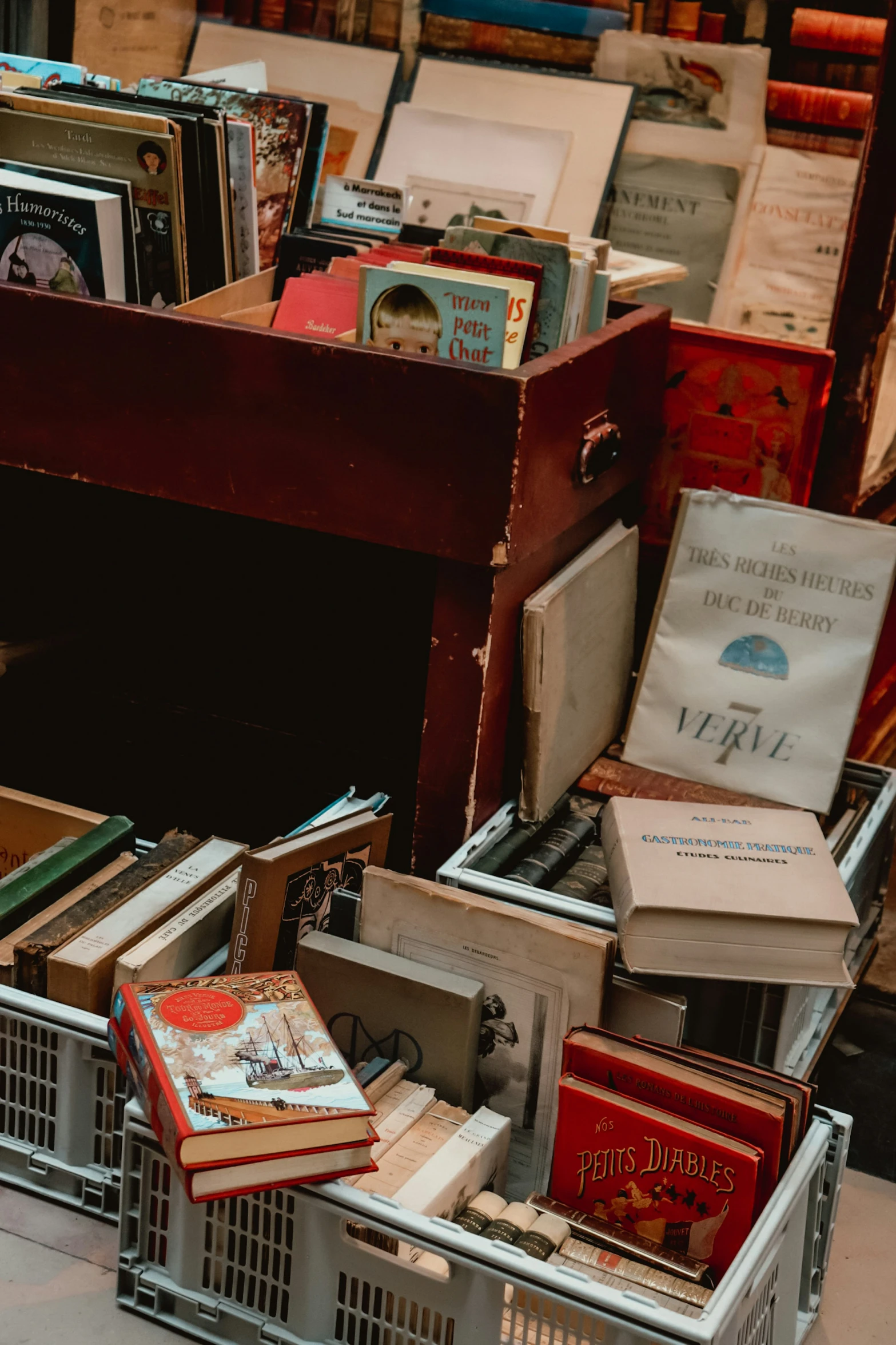 a bunch of books stacked up on top of each other