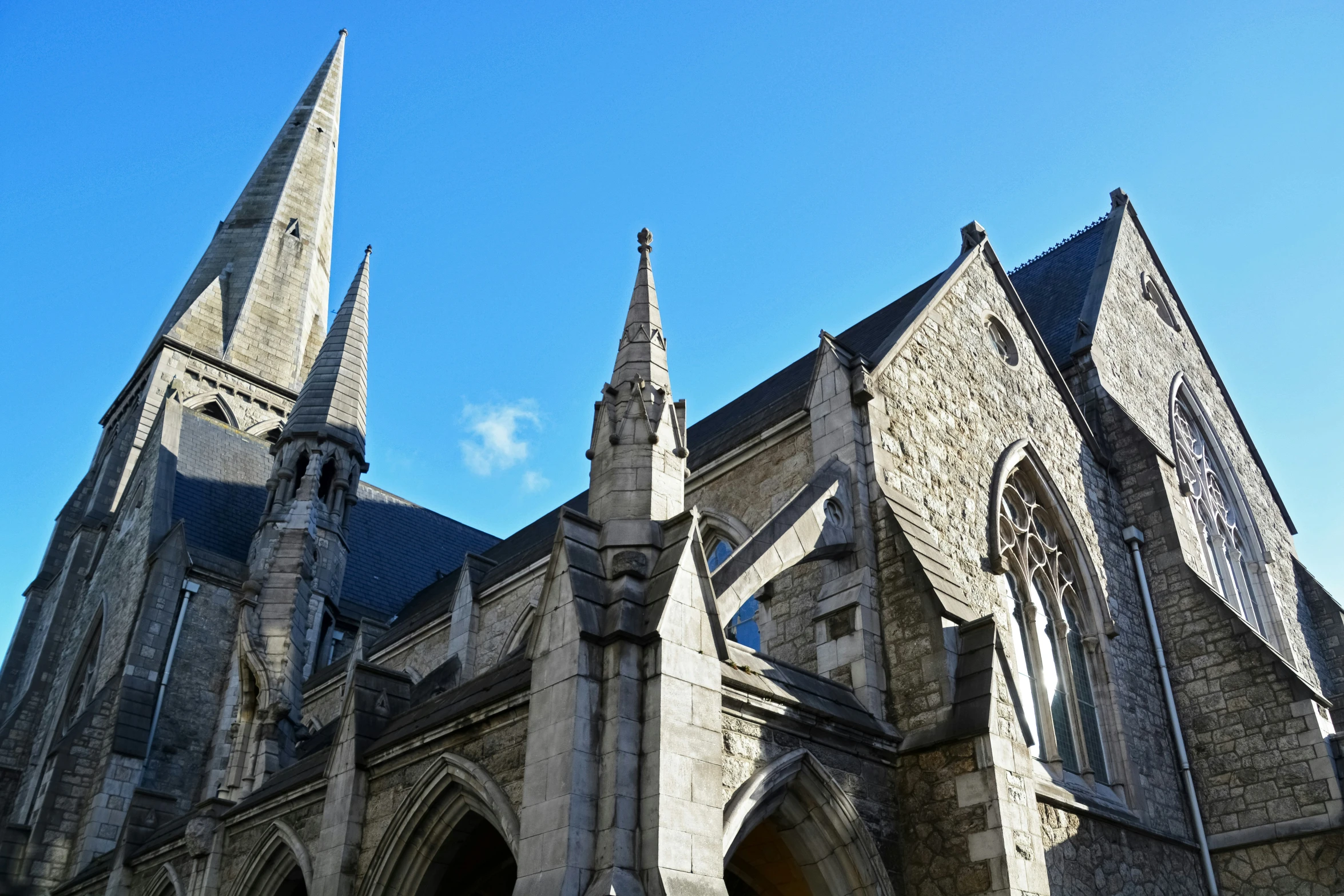 a tall church with two steeples on each side