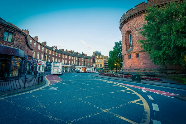 an empty road in the middle of town