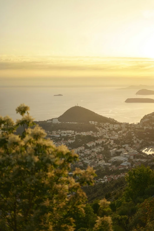 this is a beautiful view of some mountains and the sea