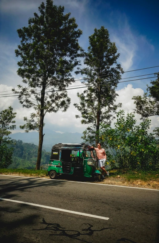 the truck is stopped on the side of the road