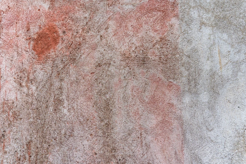 red dirt and black stains are shown in color
