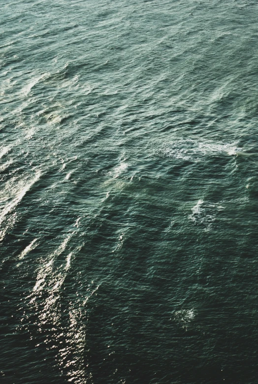 boat sailing across open water on clear day