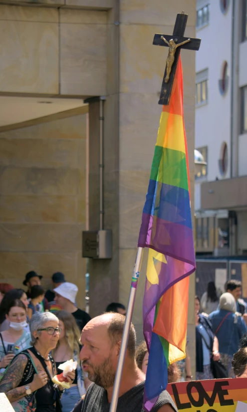 people standing and walking on a city street