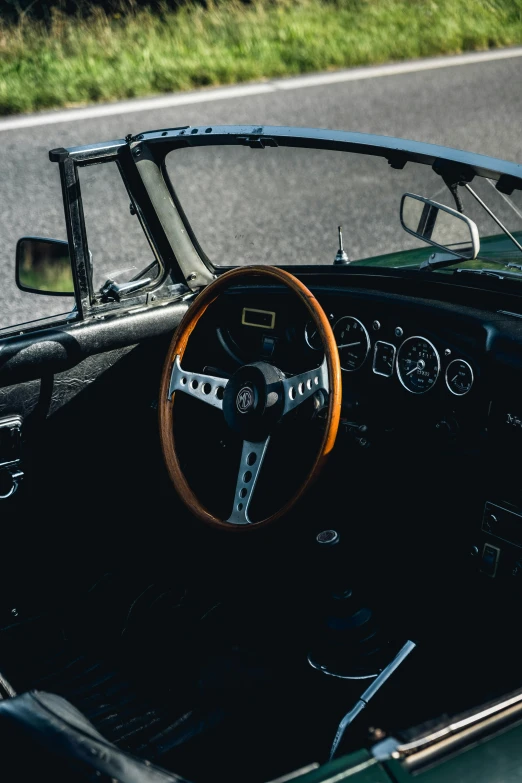 the interior of a sports car on the road