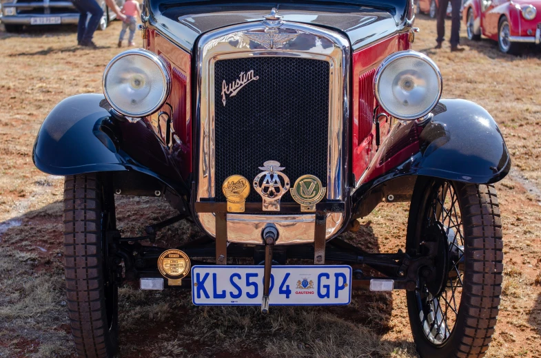 this is an old time car in a field