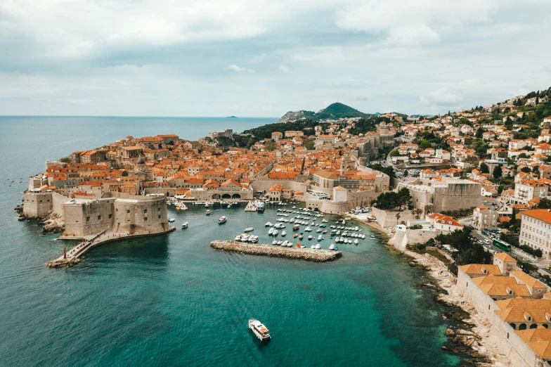 an aerial view of the harbor, boats and buildings