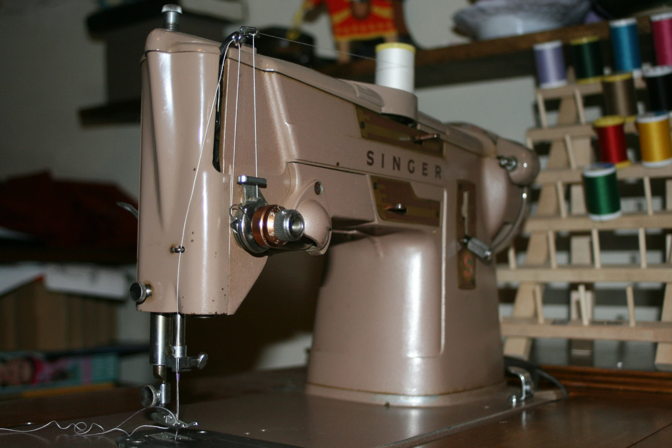 an old sewing machine on top of a table