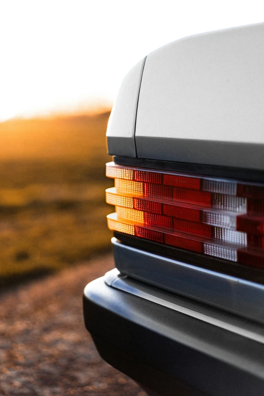 the tail lights of a car that has red light on